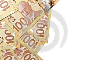 Directly Above Image of Crisp Canadian 100 One Hundred Dollar Bills on a White Background