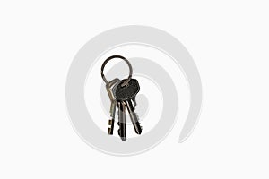 Directly above photo, bunch of keys, three keys in a bunch isolated on white background