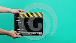 Director Film Slate. Film crew hold and clapping film slate in video recording