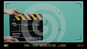 Director Film Slate. Film crew hold and clapping film slate in video recording