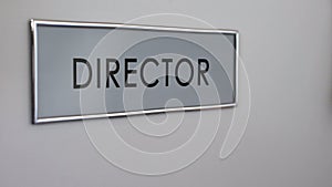 Director office door, manager hand knocking closeup, business company leader