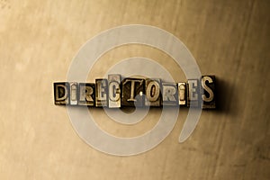 DIRECTORIES - close-up of grungy vintage typeset word on metal backdrop