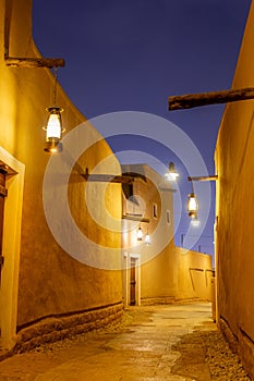 Diriyah old town traditional street illuminated at night, Riyadh, Saudi Arabia photo