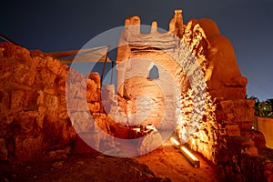 Diriyah old town walls illuminated at night, Riyadh, Saudi Arabia photo