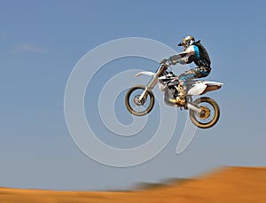 Dirt Bike Jumping - Panning photo