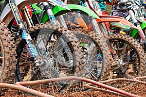 Dirt Bike Tires Lined Up At Start Of Motocross Race