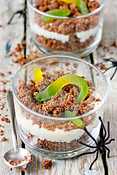 Dirt cups with gummy worms , Halloween dessert photo