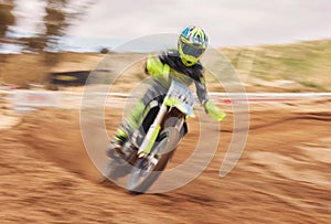 Dirt, motion blur and motorbike cycling for sports, agile driving and off road adventure for speed, power or performance
