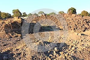Dirt mound at construction site photo