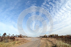 Dirt Road with Altocumulus Clouds