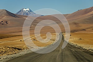 Dirt road in Atacama desert, volcanic arid landscape in Chile, South America