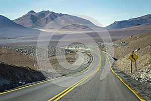 Dirt road in Atacama desert, volcanic arid landscape in Chile, South America