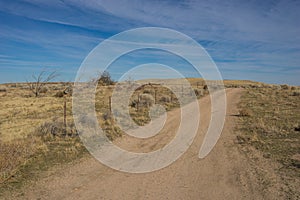 Dirt Road Beside Barbed Wire Fence