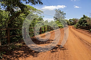 Dirt road with a bridge over Sao Lourenco river, at Sao Paulo state. Araraquara region photo