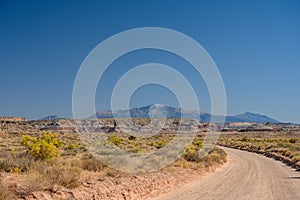 Dirt Road Cuts Through Desert