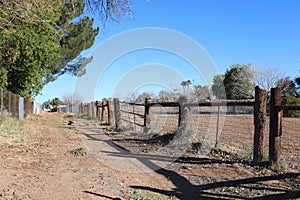 Dirt Road between fences in Phoenix, Arizona