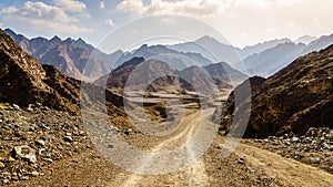 Dirt road in Hajar mountains in Dubai, UAE