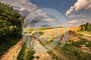 Dirt road and haystack