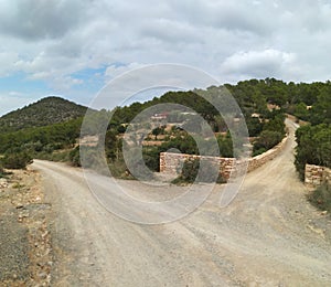 Dirt road. hinterland of the island of ibiza. crossroads. bifurcation