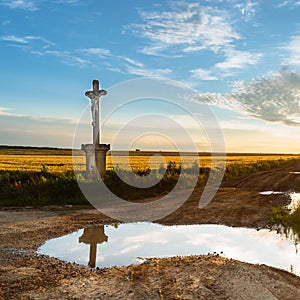 A dirt road in the hungarian countryside after a refreshing summer rain