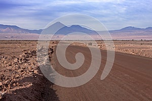 A dirt road leads to the Volcano Licancabur in San Pedro de Atacama