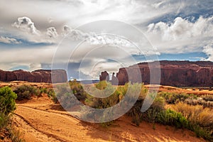 Dirt road through the Monument Valley desert