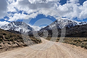 Dirt Road Towards The Mountains