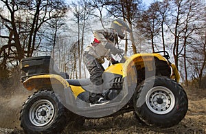 Dirt spinning of the ATV quad bike wheels