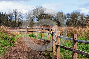 Dirt Trail along Wooden Rail Fence