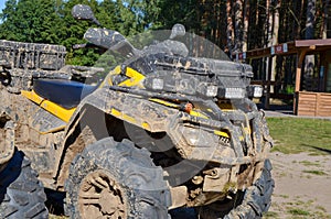 A dirty ATV quad bike