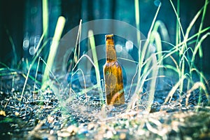 Dirty brown beer bottle