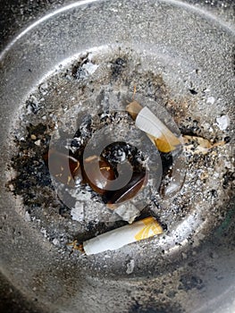 Dirty cigarette ashtray