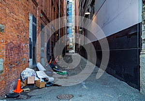 Dirty city alley with garbage. Municipality sanitation and public health