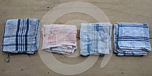 Dirty cloth napkin on wooden background