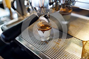 Dirty Coffee - Coffee machine pours espresso shot into a glass of cold fresh milk.