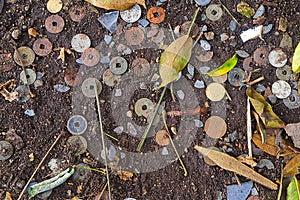 dirty coin money on the ground