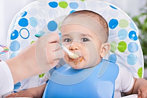 Dirty cute baby enjoy when eating food