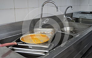 Dirty dishes kept for washing at a restaurant