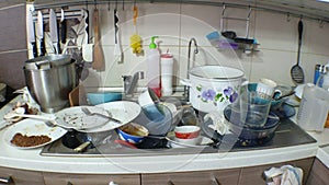 dirty dishes in the kitchen, disconnections and interruptions in the water supply, a sloppy hostess