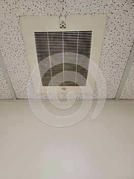 Dirty exhaust vent in public bathroom