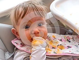 Dirty face of feeding baby