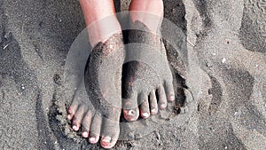 dirty feet because of beach sand