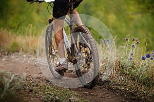 dirty feet and mountain bike male athlete mountainbiker