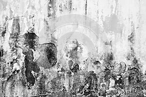 Dirty and flaked old wall texture in black and white photo