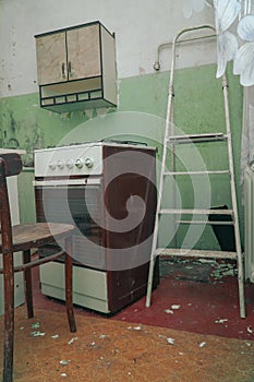 Dirty gas stove in the old kitchen