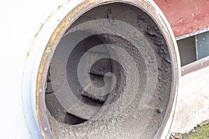 Dirty and greasy the blades of the radial fan vent closeup, require urgent cleaning