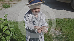 dirty hands child concept. kid shows camera dirty unwashed palms fingers summer