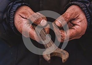 Dirty hands of a man, a working man, a man drained his hands while working, a poor man