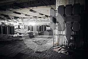 Dirty industrial interior of an abandoned factory building