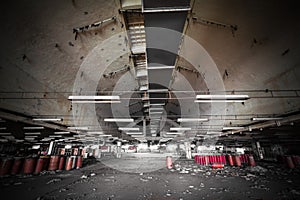 Dirty industrial interior of an abandoned factory building